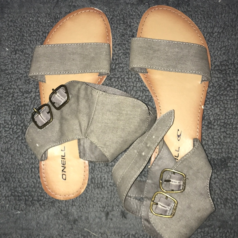 Buckle sandals.